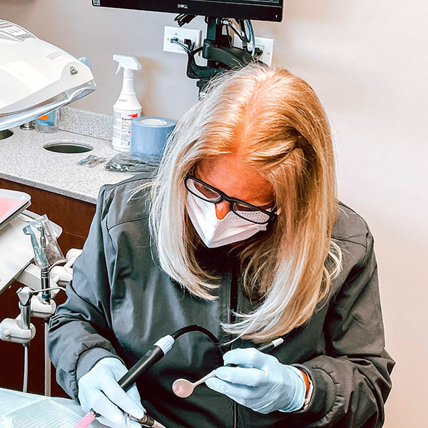 One of our staff members during a dental procedure